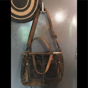 Mayra Bag. Distressed leather, 10”x13”x10”.